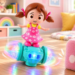 A dancing doll toy with a pink dress and pigtails spins on a teal base, projecting colorful lights onto a wooden floor.