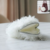 Soft fluffy mini coin purse close up