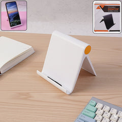 Foldable plastic desktop mobile stand on flat surface