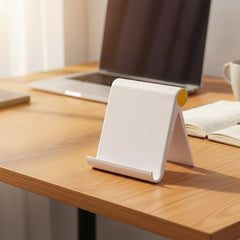 Foldable mobile phone holder on a desk