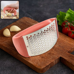 Supermom Garlic Press crusher with curved ergonomic handle