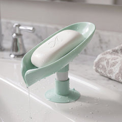 Close-up of waterproof plastic soap holder with leaf design and drainage system