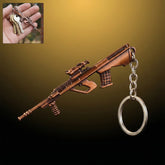 Metal gun shape keychain with antique finish