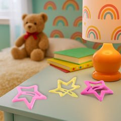Three star-shaped snap hair clips displayed on white background