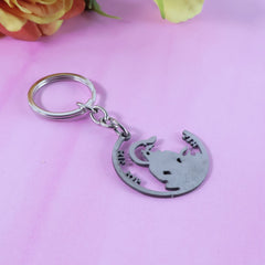 Jai Shri Ram keychain on a wooden surface