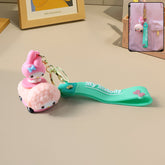 Cute cartoon character silicone keychain on white background