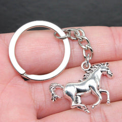Durable metal horse keychain on a white background