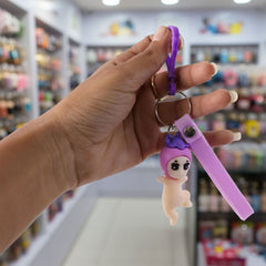 Close-up of baby doll silicone keychain charm