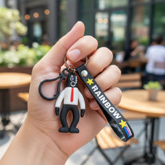 Keychain showing cartoon figure and strap detail