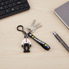 Cartoon key ring attached to backpack zipper