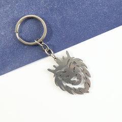 Close-up detail of stainless steel lion head keychain