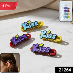 Set of four 'Kiss' hair clips with packaging