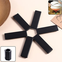 Foldable trivet mat in star shape on a kitchen counter