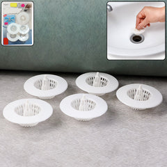 White plastic sink drain hair catcher filter