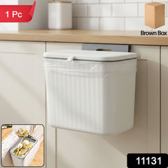 Plastic kitchen dustbin with lid, wall mounted