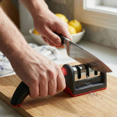 Close-up of sharpening blades in knife sharpener
