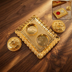 Square golden kumkum holder with floral lid and beaded border for pooja rituals