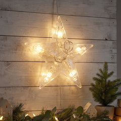 Close up of a single lit star bulb