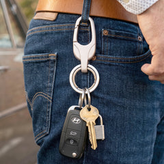 Metal keychain with two keyrings, showcasing its versatile design