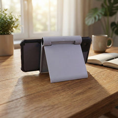 Close-up of plastic mobile stand in use
