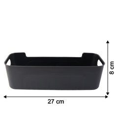 Black plastic storage baskets arranged for organizing