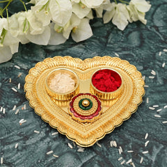 Organized storage of kumkum, roli, haldi, and chandan in a heart-shaped pooja box