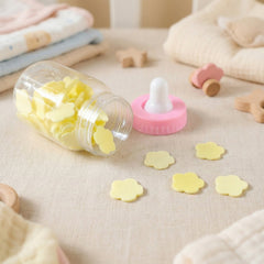 Compact baby bottle soap paper container held in hand