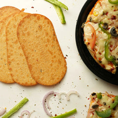 Maniarr's Pizza Mini Slim Bites scattered on surface