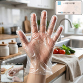 Person wearing clear disposable plastic gloves for food prep