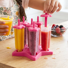 Hand holding ice cream mold filled with frozen popsicle