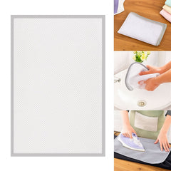 Transparent ironing press net on a fabric