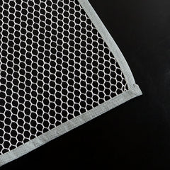 Hand holding the lightweight ironing press net
