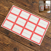 Red and white rectangular self-adhesive label sheet