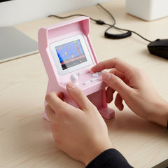 Toy arcade gaming console with joystick and buttons