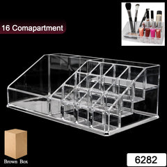 Close-up of clear acrylic compartments holding makeup items