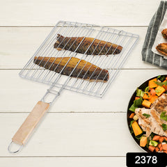 Close-up of lockable grill grate with wooden handle
