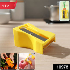 Vegetable sharpener and peeler tool in hand