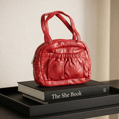 Versatile mini handbag with top handles, perfect for outings