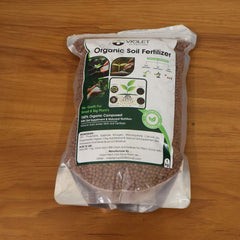 Organic soil fertilizer enhancing plant growth
