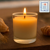 In'lief Ocean Beach scented votive candle in clear glass jar