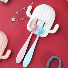 Compact cactus toothbrush holder mounted on bathroom wall