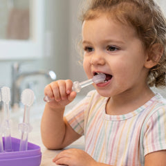 Baby toothbrush set ideal for daily oral care, soft silicone bristles and easy grip handles