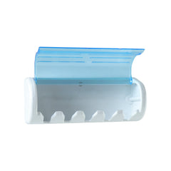 Protective cover of toothbrush holder opened showing toothbrush slots