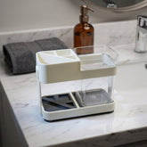 Multipurpose toothbrush holder set in bathroom
