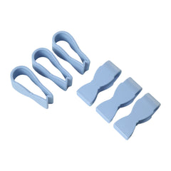 White towel clips holding a towel on a bathroom bar