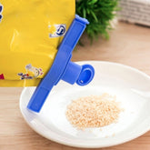 Seal pour food bag clip with discharge nozzle