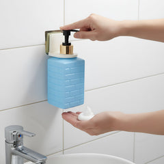 Installed wall-mounted liquid soap dispenser