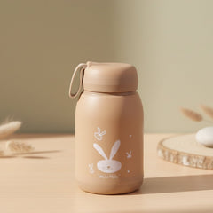 Glass water bottle showing bunny design