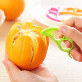 Snail-shaped orange peeler with creative ring design
