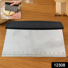 Close-up of dough scraper showing measurement etchings
